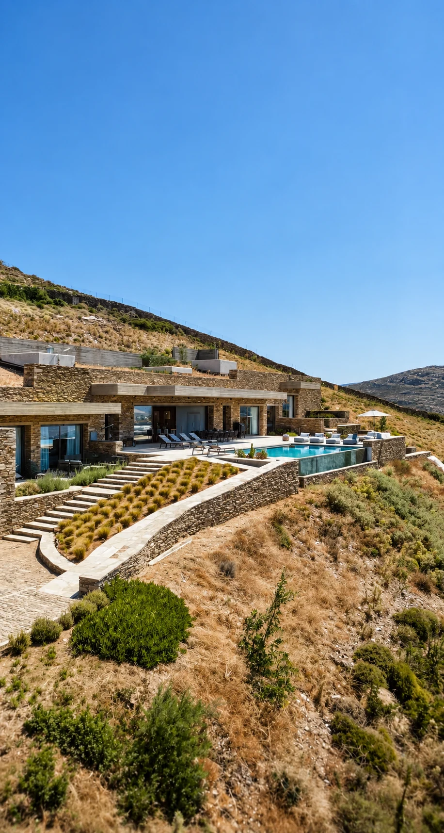 Androsthea villa set into the hillside above Kypri, Andros
