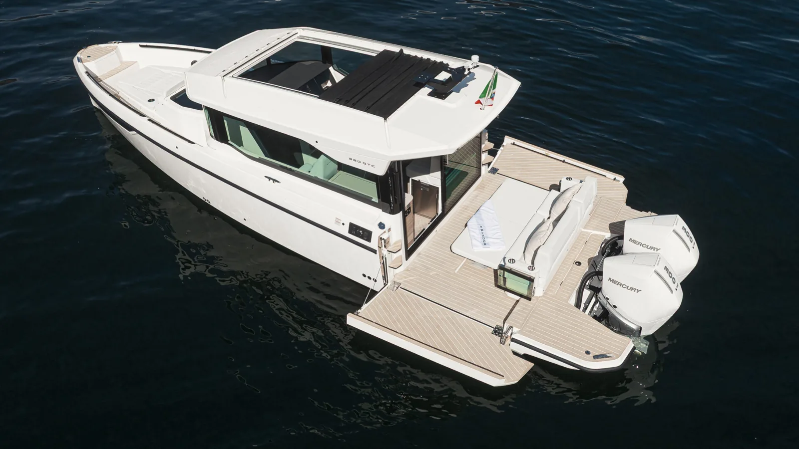 Saxdor 320 GTC model with enclosed wheelhouse and open aft deck
