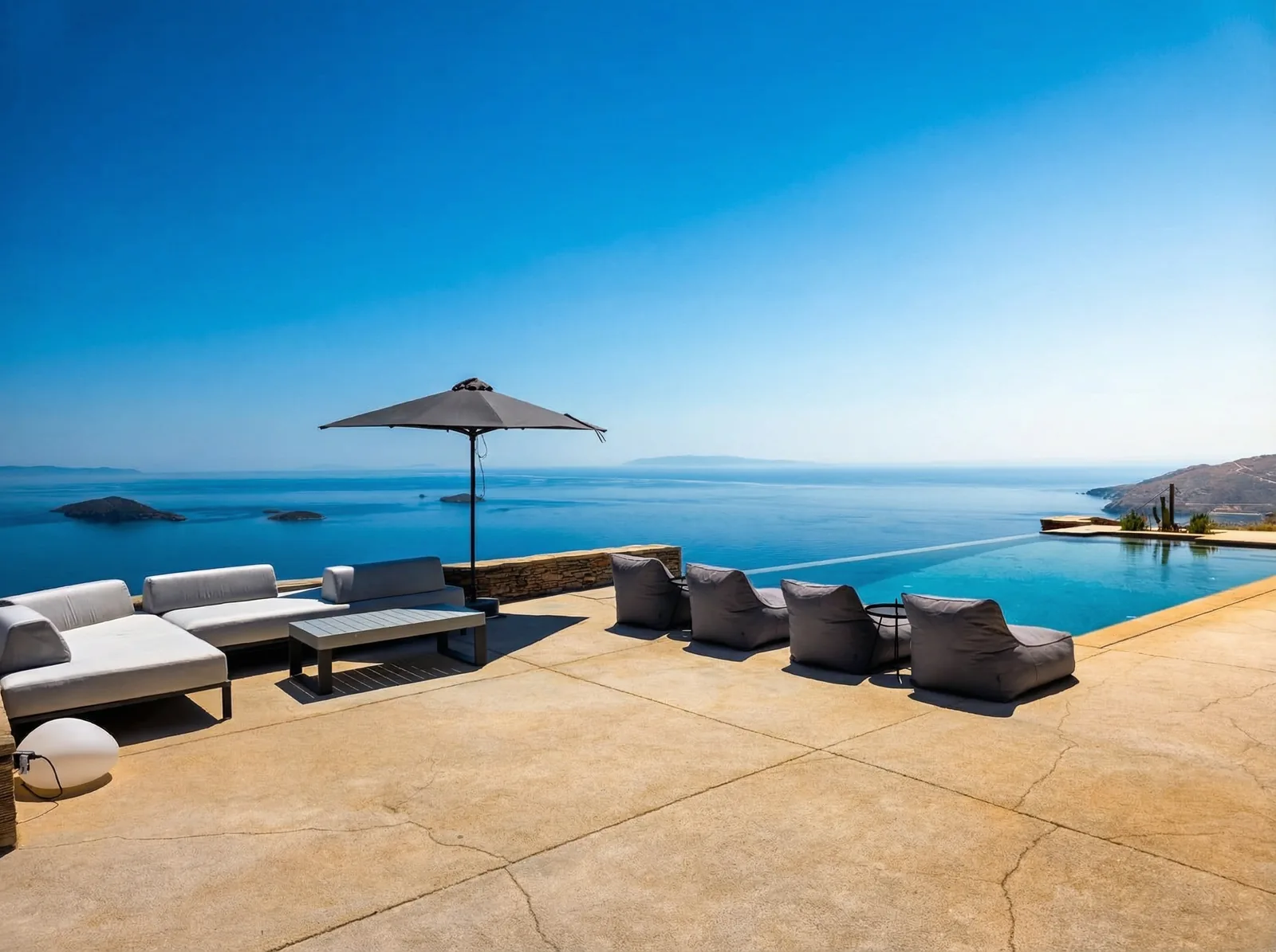 Infinity pool terrace with Aegean views